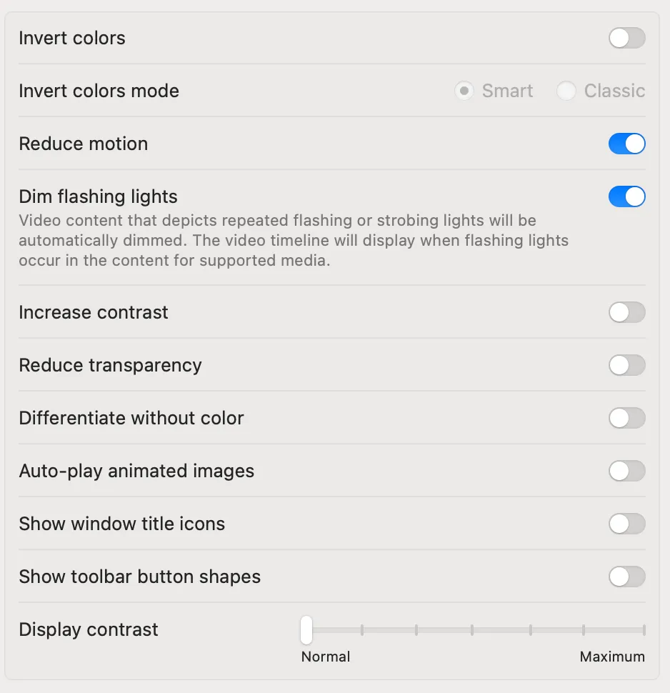 Display settings on MacOS, with Reduce Motion, Dim Flashing Lights turned on, and Auto-play Animated Images turned off.